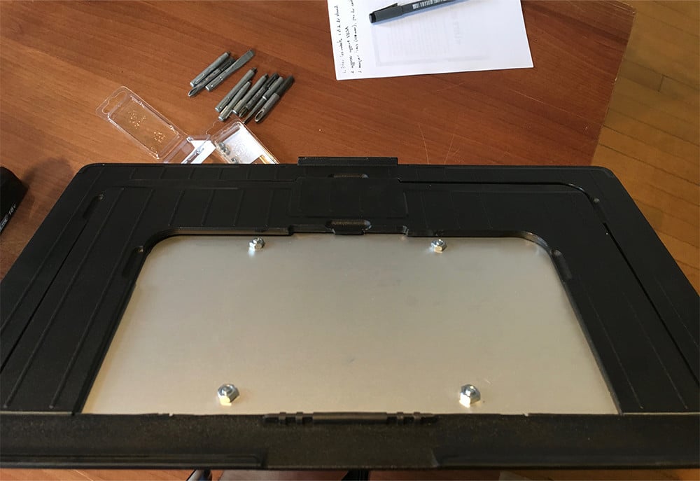 The thin nuts mean no contact between your mounting hardware and the Cintiq itself